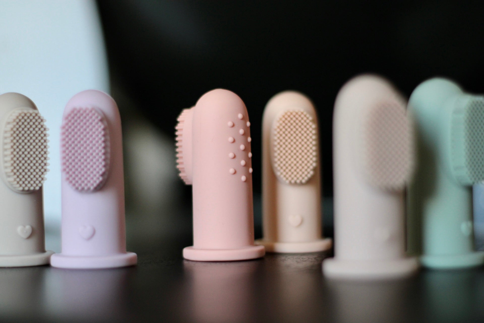 Spazzolino in silicone (Pesca/Panna)